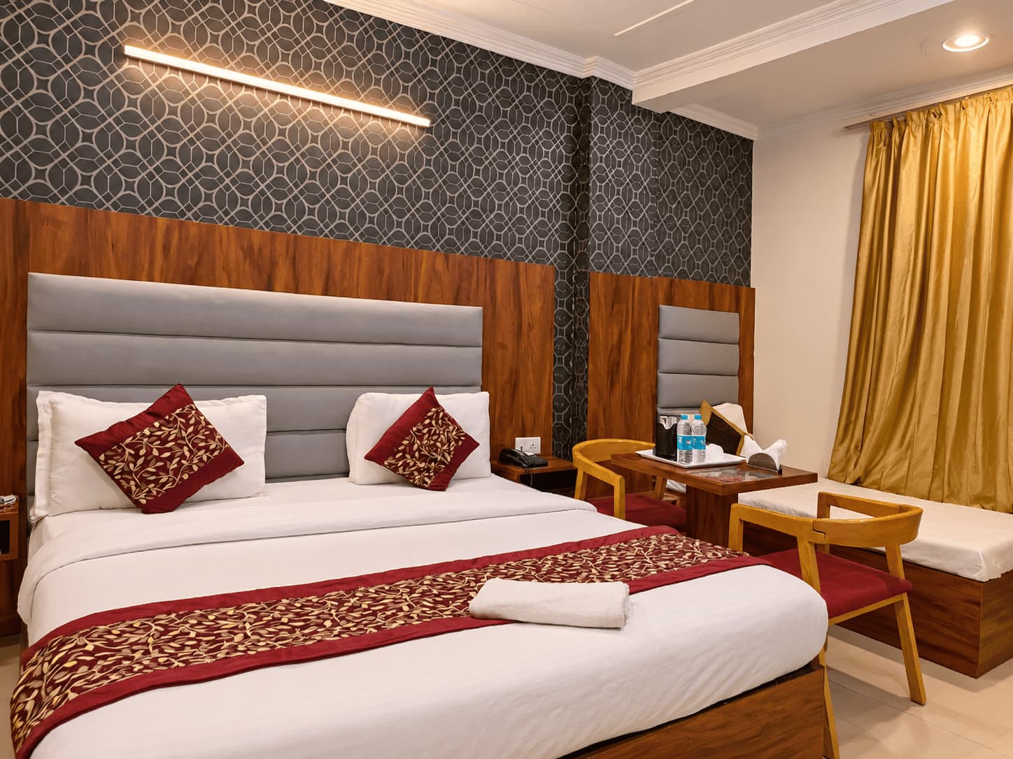 Executive Room with a king bed and a small sitting area